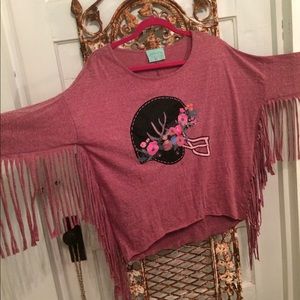 Judith March fringe football helmet shirt